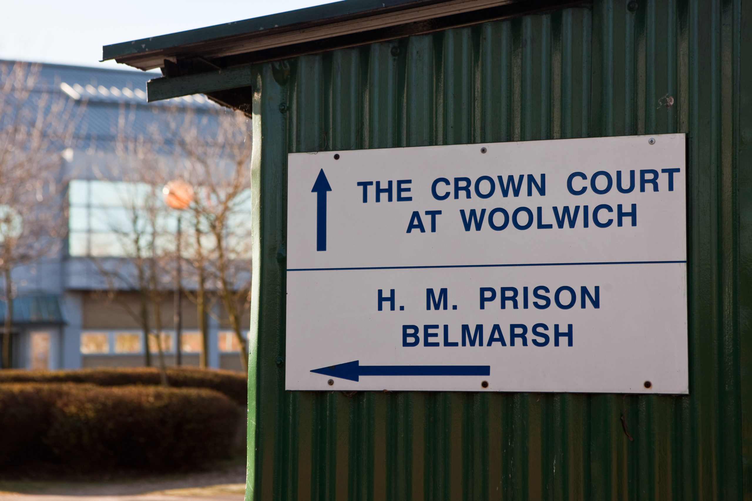 A sign showing the direction to Woolwich crown court; HMP Belmarsh. Photo: Andy Aitchison