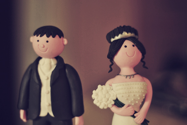 Bride & groom wedding cake figurines photo by bigpresh via a Creative Commons License on Flickr.