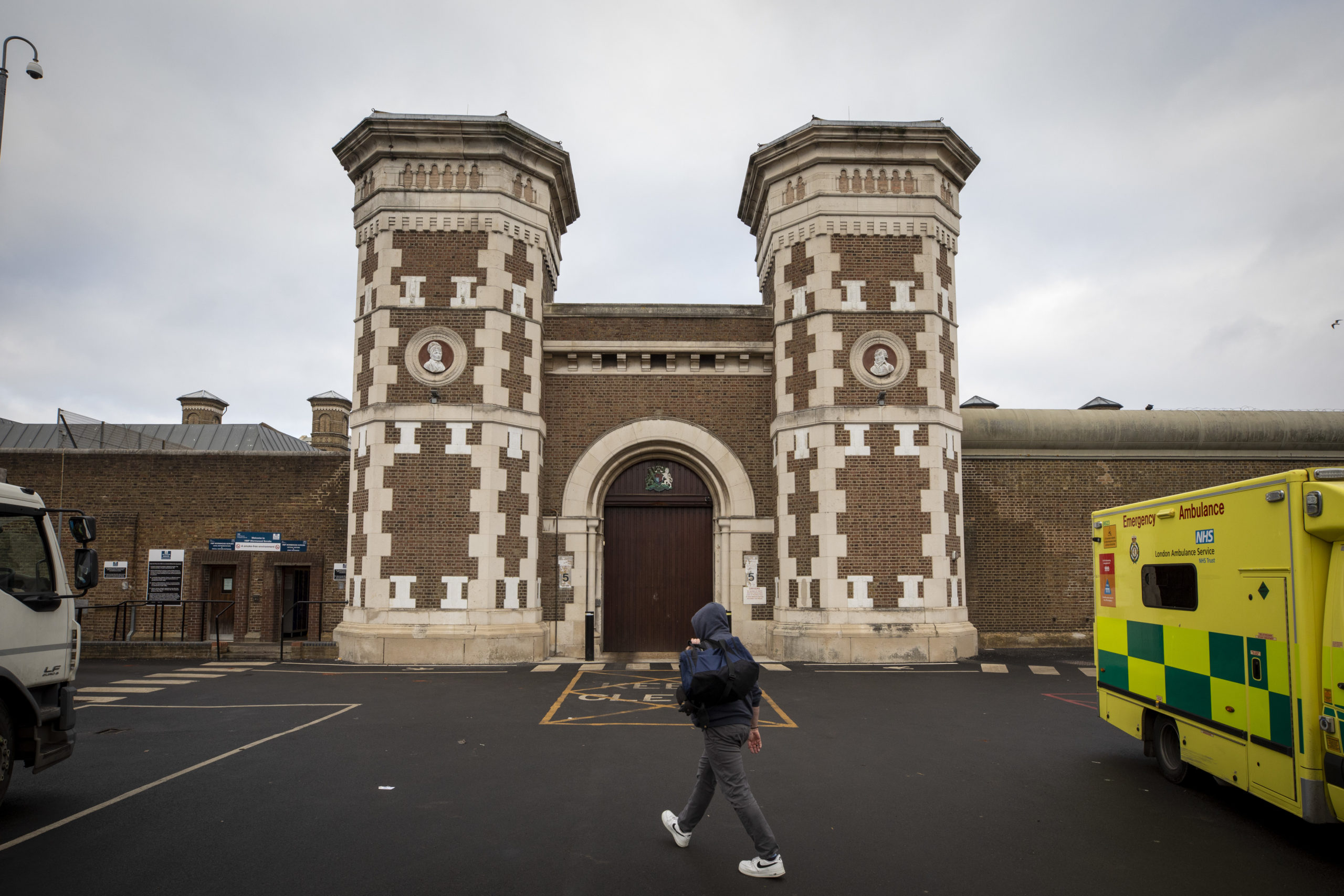 A prison officer walking through the main entrance to HMP Wormwood Scrubs on the 19th of January 2022, HMP Wormwood Scrubs, London, United Kingdom. (Picture by Andy Aitchison)